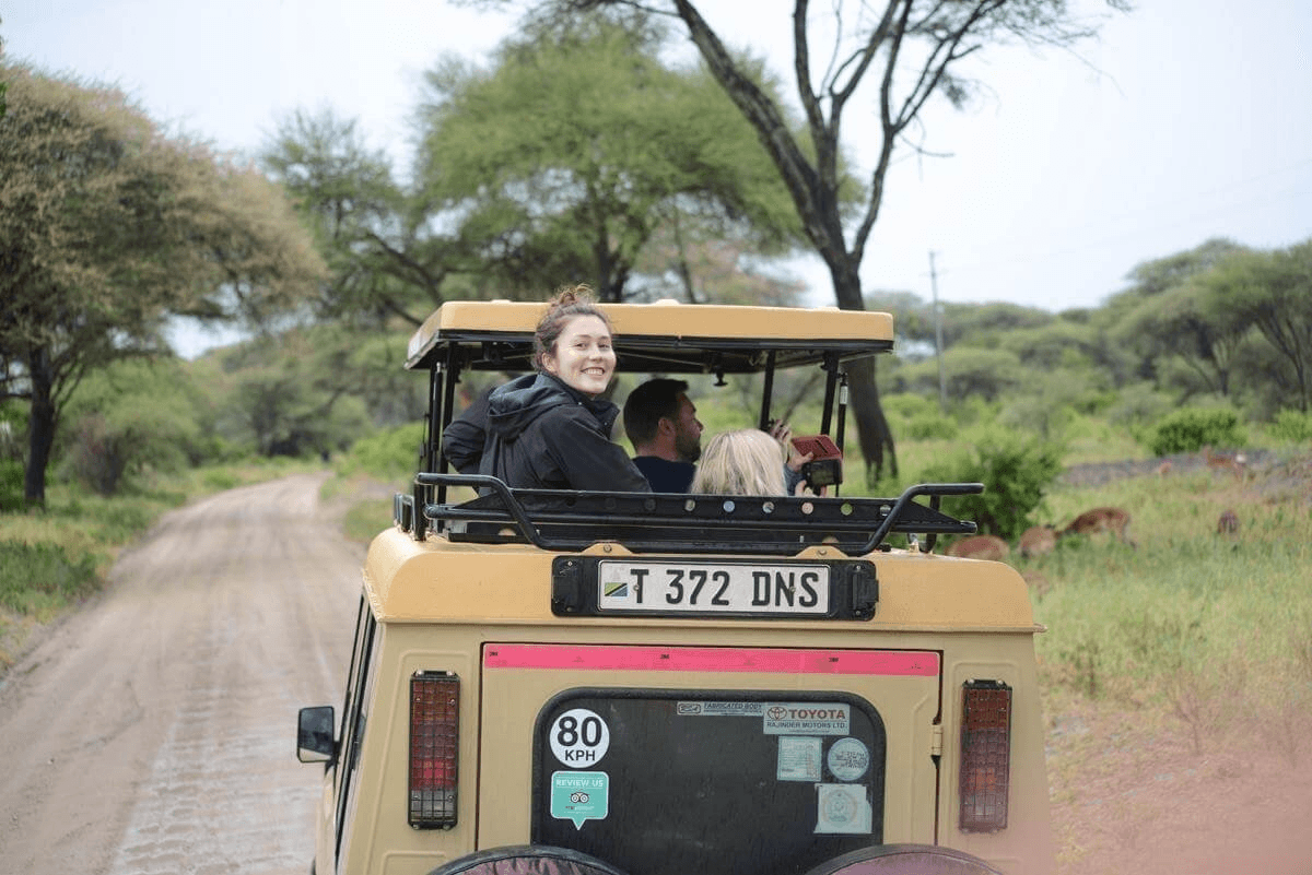 Travelers in a Chatama Safaris vehicle